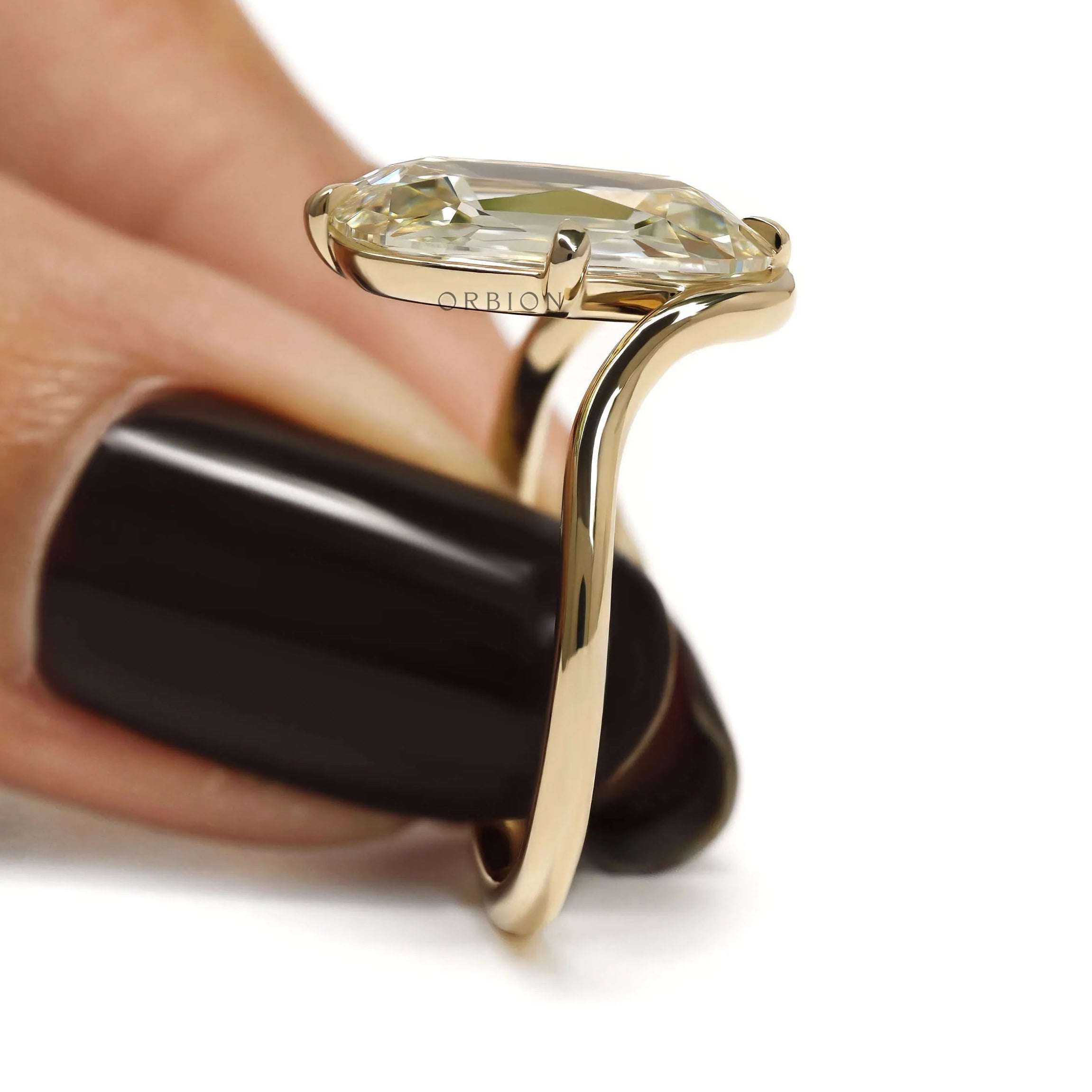Modern Bypass Elongated Cushion Engagement Ring in Yellow Gold