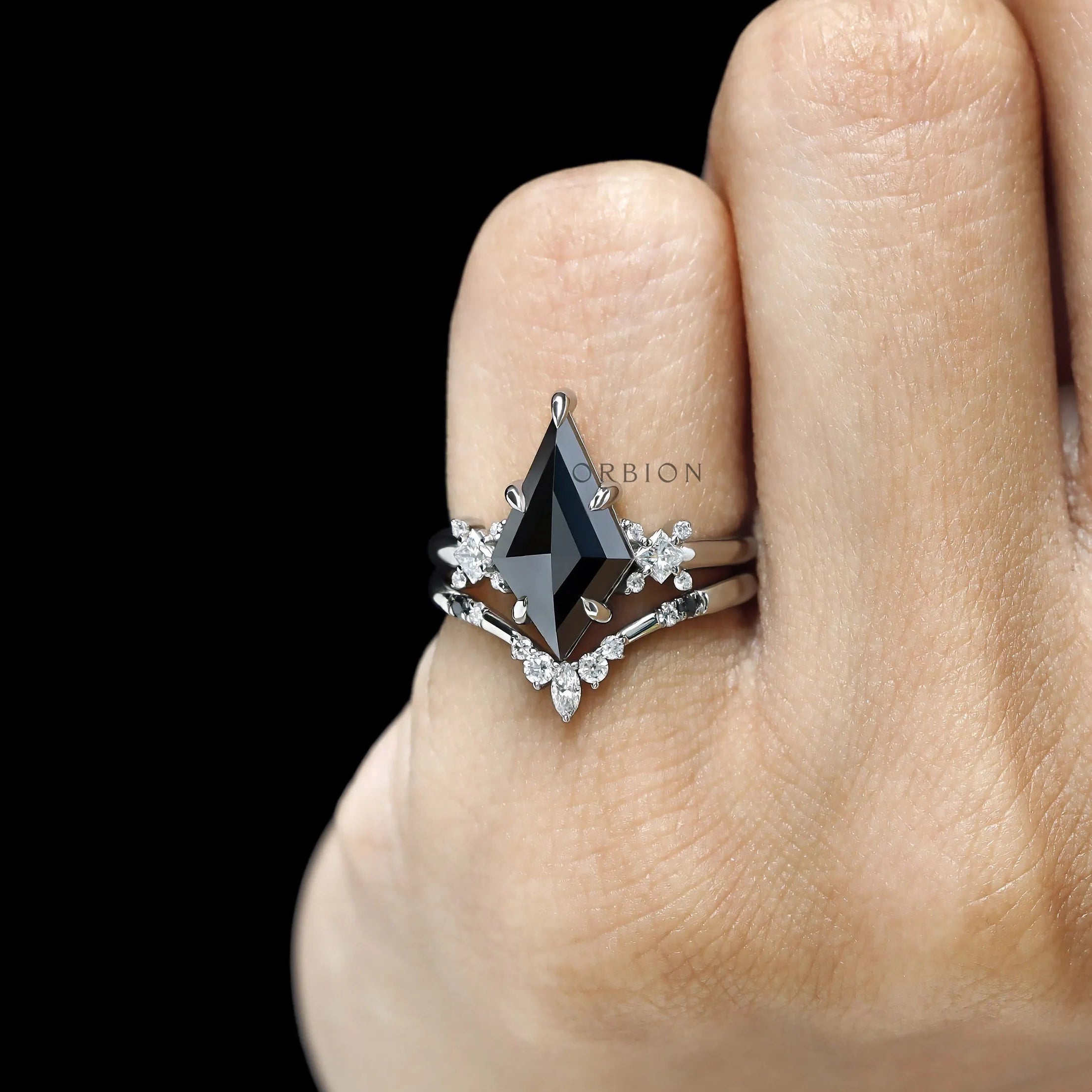 Kite cut black moissanite gothic engagement ring set with solitaire design and chevron band in platinum 950