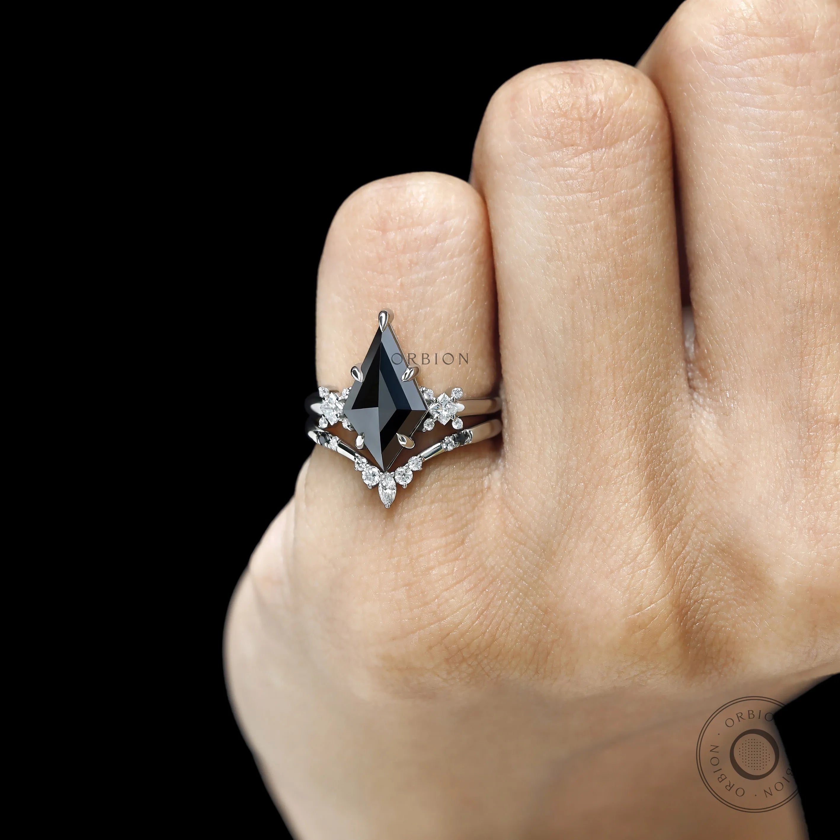 Kite cut black moissanite gothic engagement ring set with solitaire design and chevron band in platinum 950