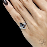 Fine jewelry gothic ring set featuring black moissanite kite cut center stone with nesting wedding band