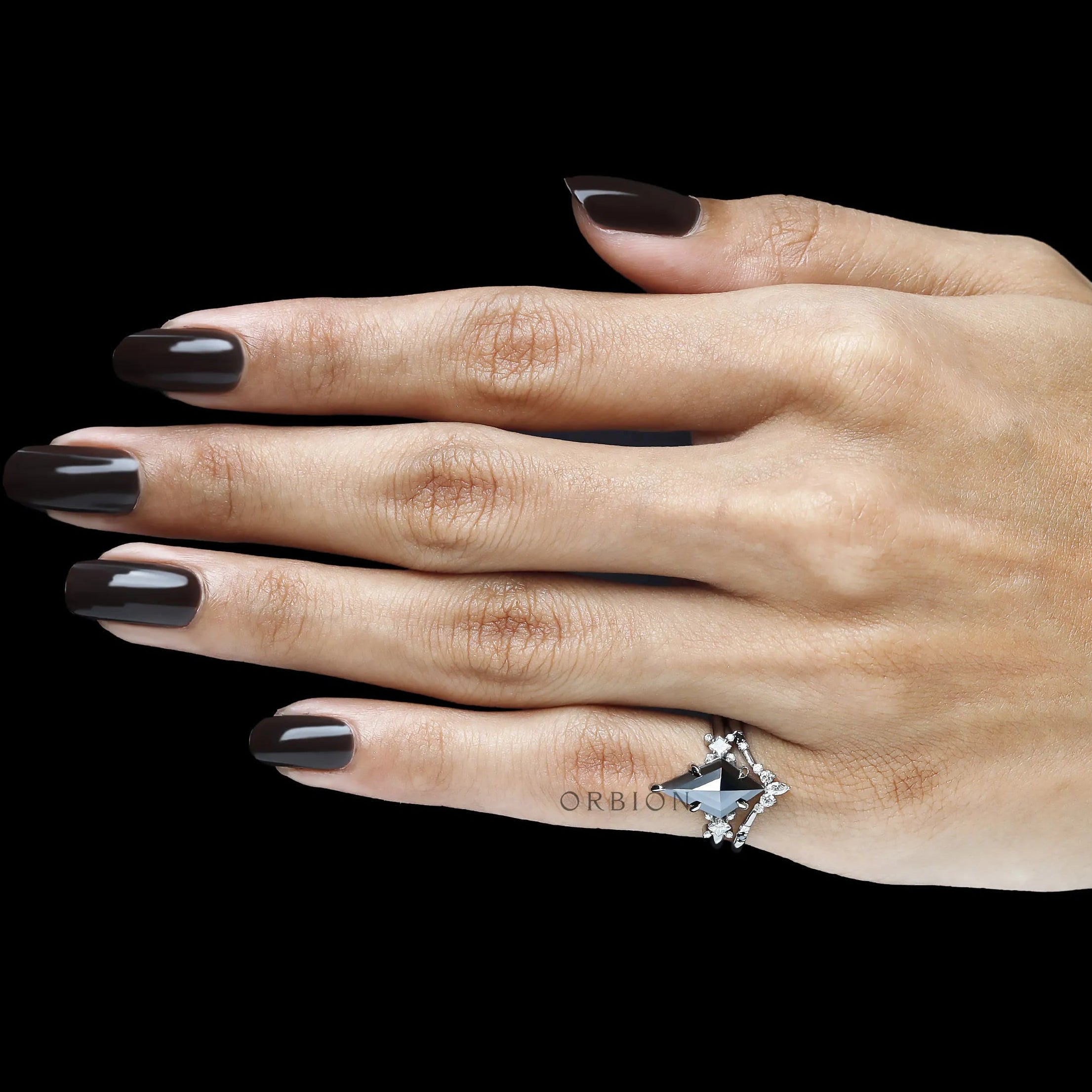 Modern gothic inspired black moissanite ring set with kite cut center stone in platinum 950