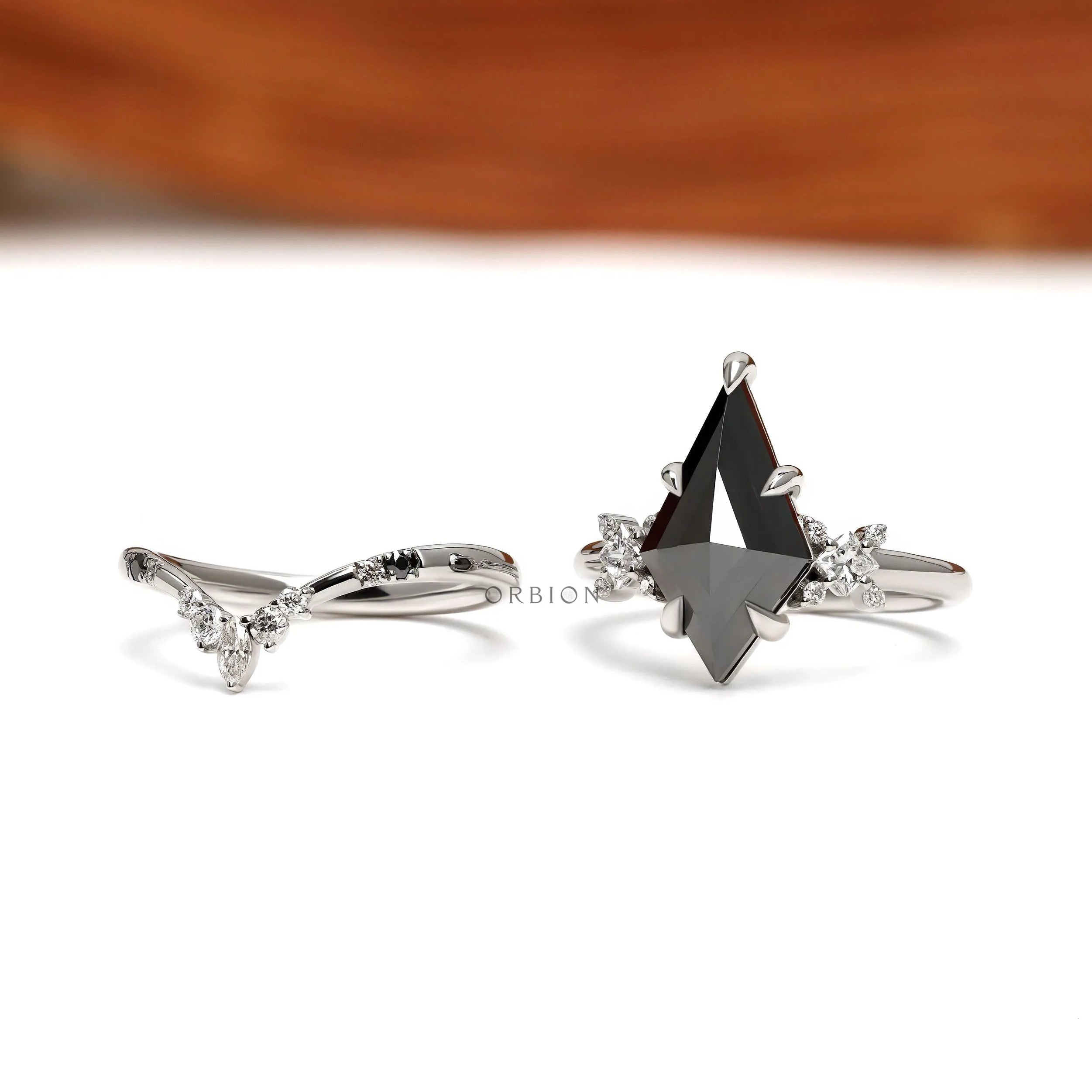 Gothic black moissanite solitaire ring with V shaped chevron band