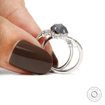 Alternative engagement ring set with kite shaped black moissanite gemstone and platinum chevron band