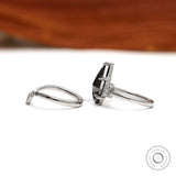 Unique kite cut black moissanite engagement ring with platinum setting and modern chevron stacking band