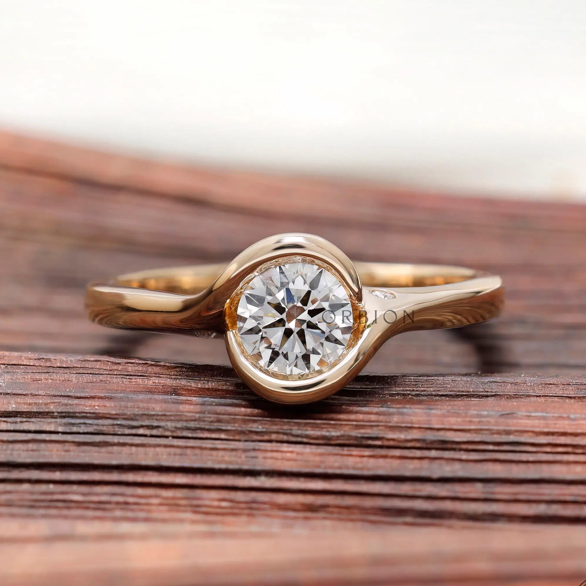 Round lab grown diamond solitaire engagement ring in 14K yellow gold