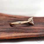 Solitaire diamond ring side profile in yellow gold