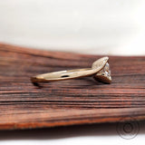Solitaire diamond ring side profile in yellow gold