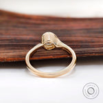 Yellow gold solitaire engagement ring