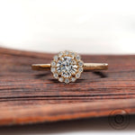Round lab grown diamond cathedral halo ring