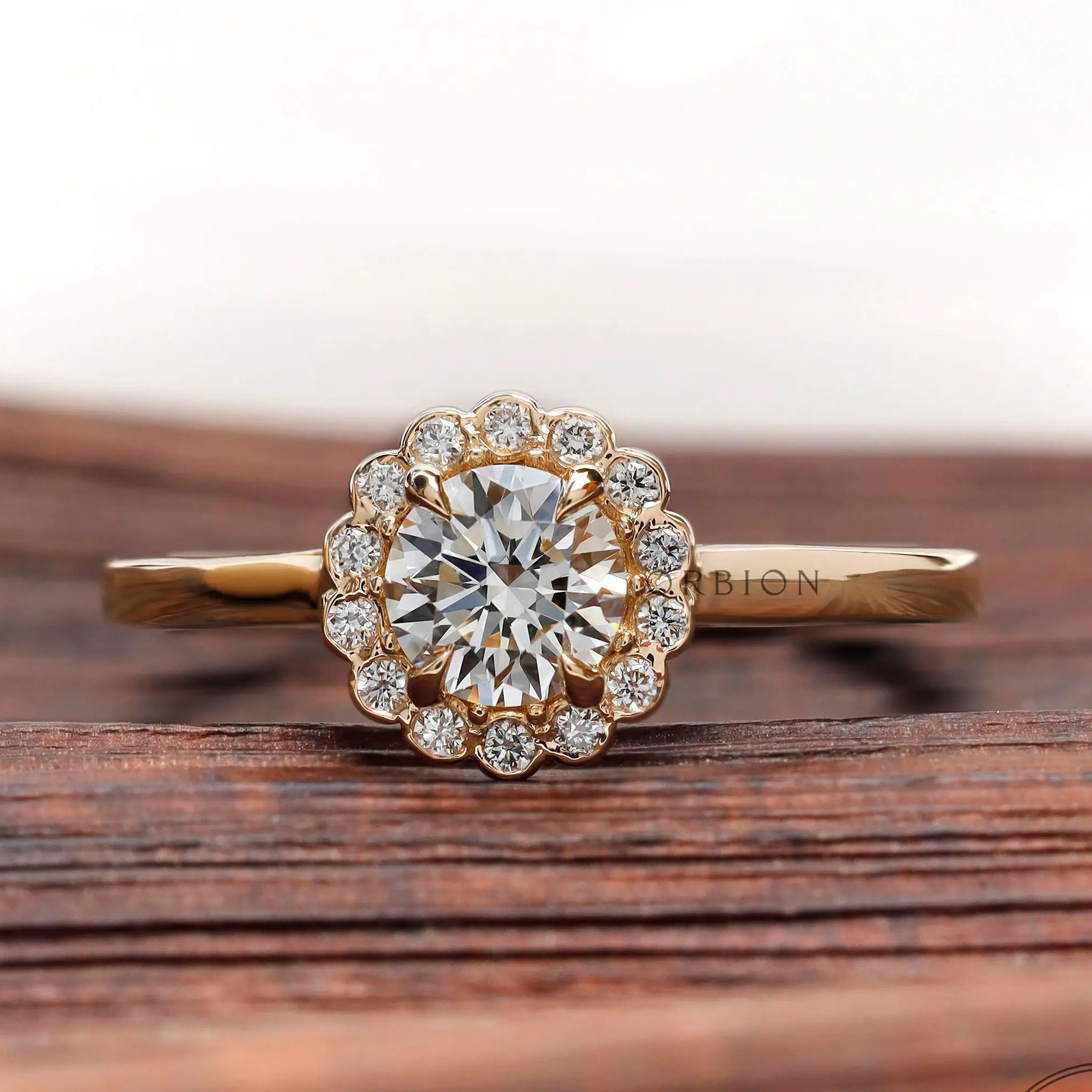 Round lab grown diamond cathedral halo ring