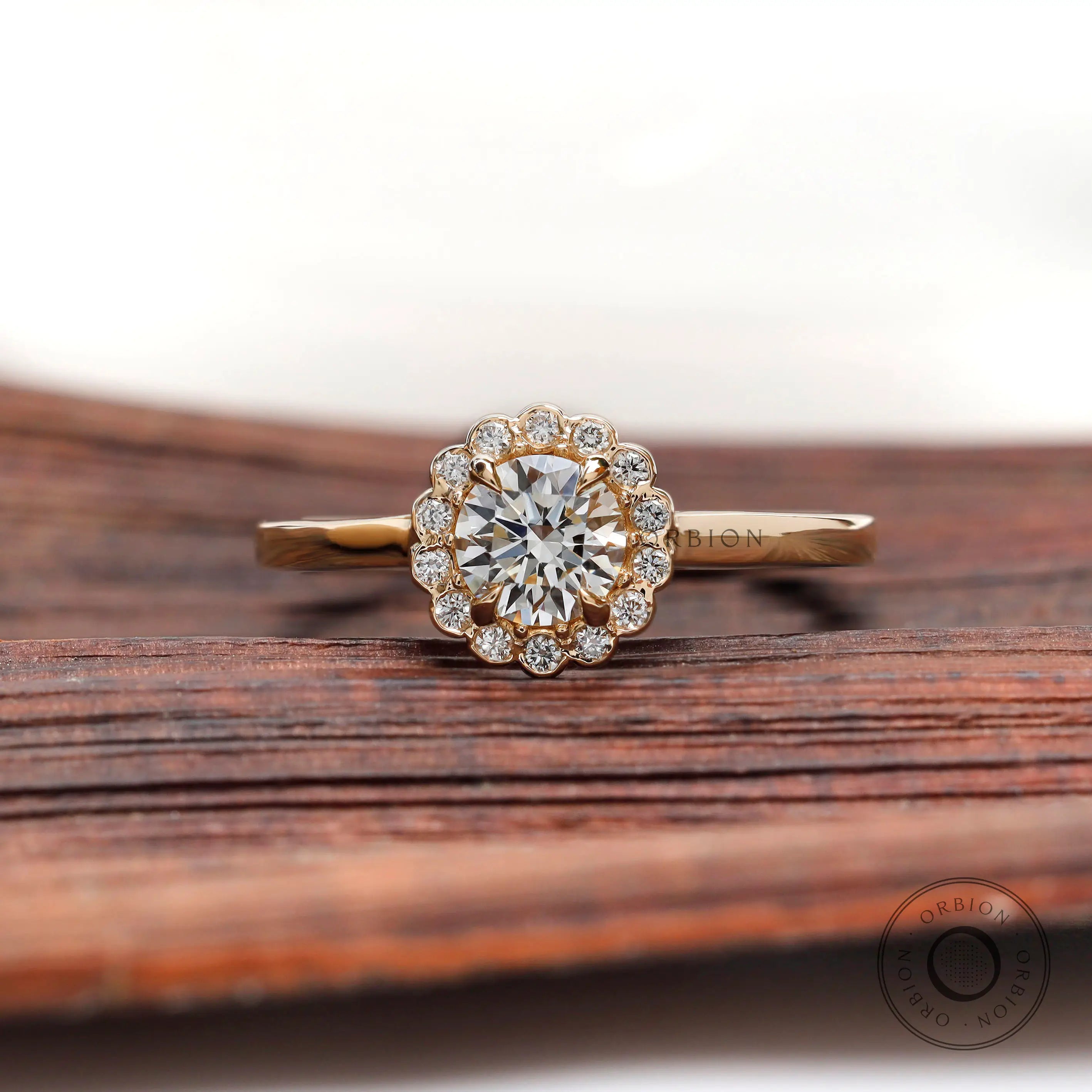 Round lab grown diamond cathedral halo ring