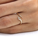 Stackable minimalist snake ring in 14k yellow gold with lab diamond