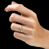 Fine jewelry snake wrap ring with flush set marquise diamond