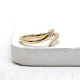 14k yellow gold snake wrap ring with marquise lab grown diamond