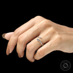 Elegant 14k white gold snake wrap ring with blue diamond