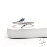 14k white gold snake blue diamond open wrap ring with flush set marquise stone
