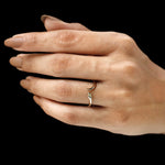 Lightweight 14k yellow gold snake ring with yellow lab diamond