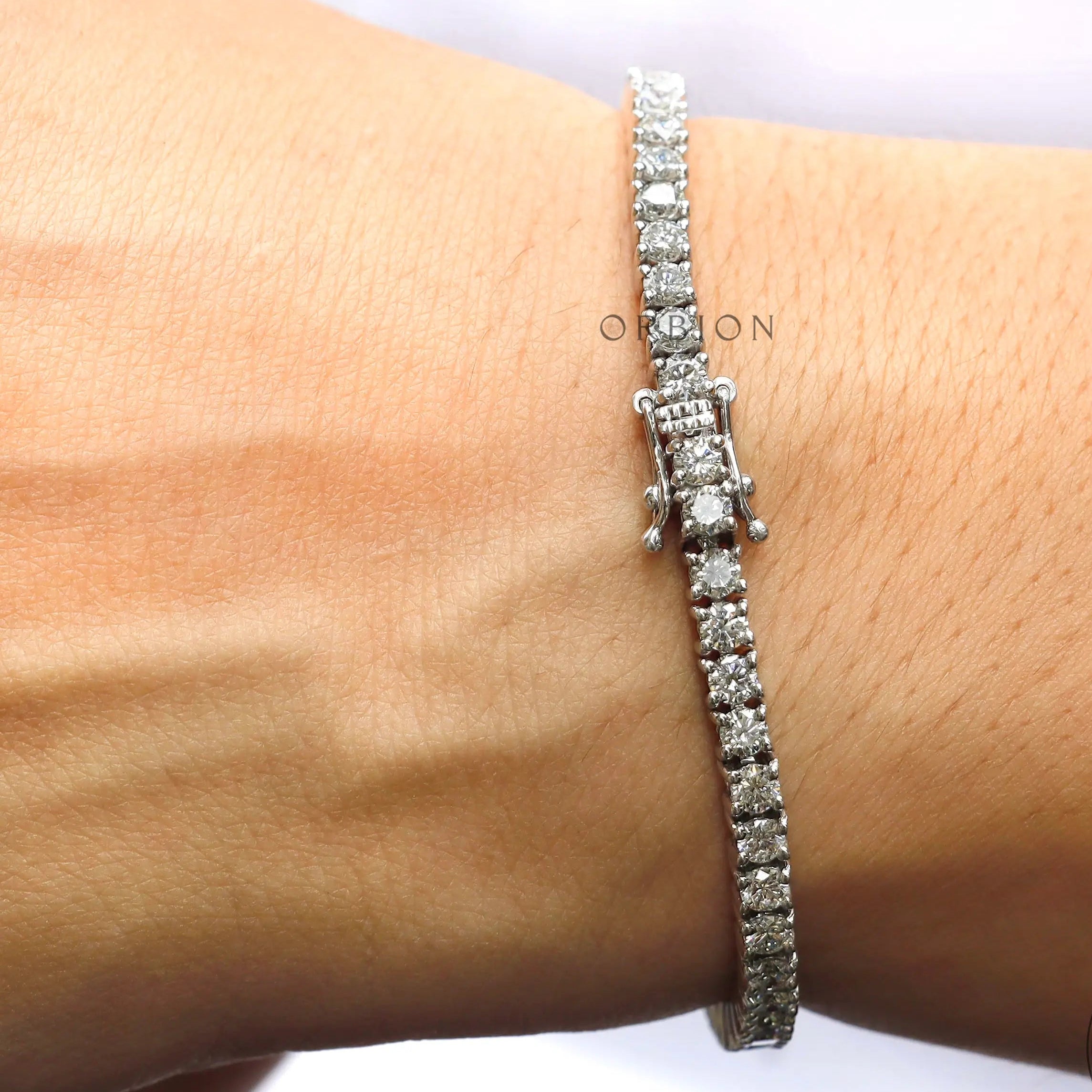 Luxury moissanite tennis bracelet clasp and setting detail
