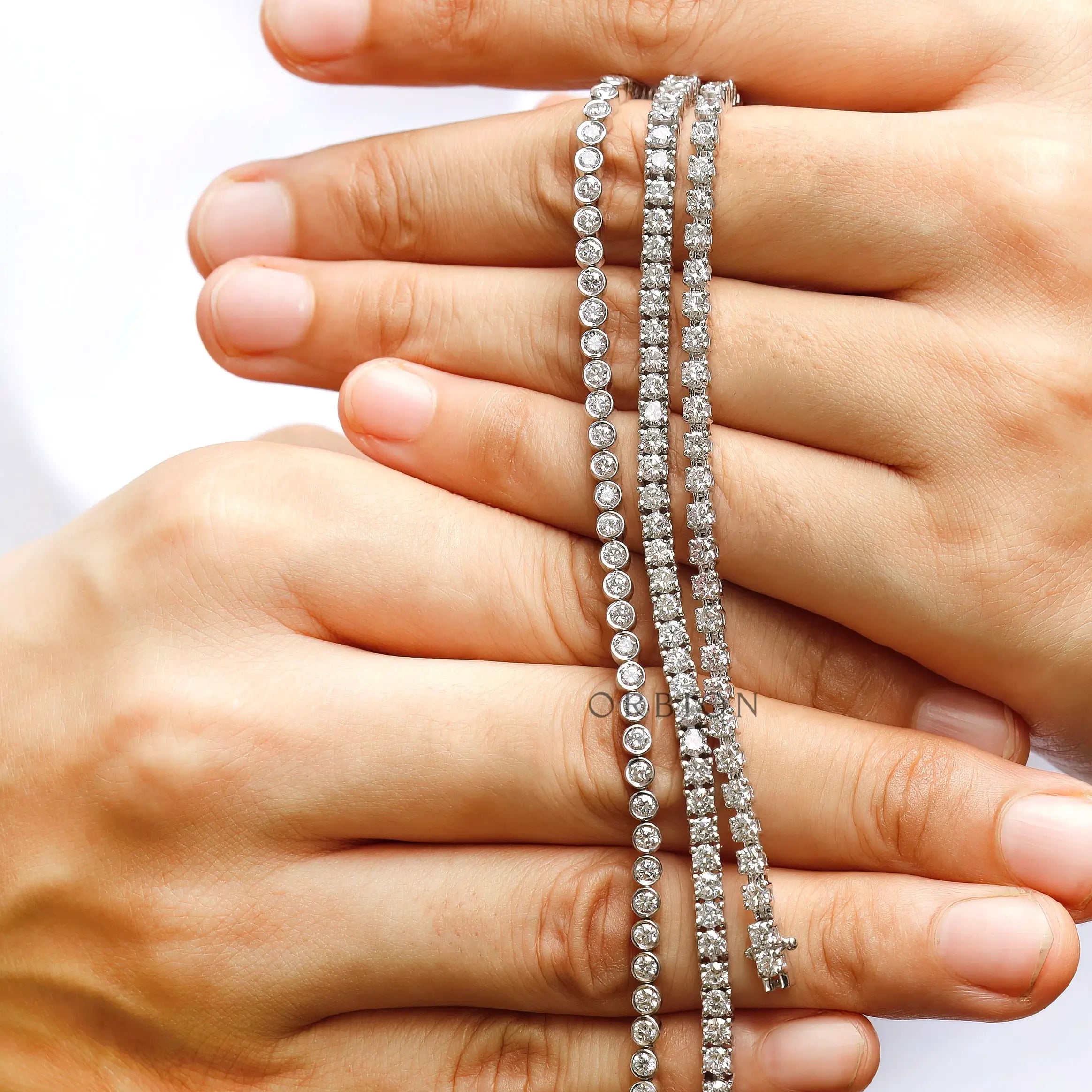 White gold tennis bracelet with continuous diamond setting
