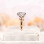 Angled side view highlighting marquise and round accent diamonds