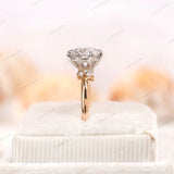 Angled side view highlighting marquise and round accent diamonds