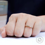 Lifestyle view of classic plain gold ring worn