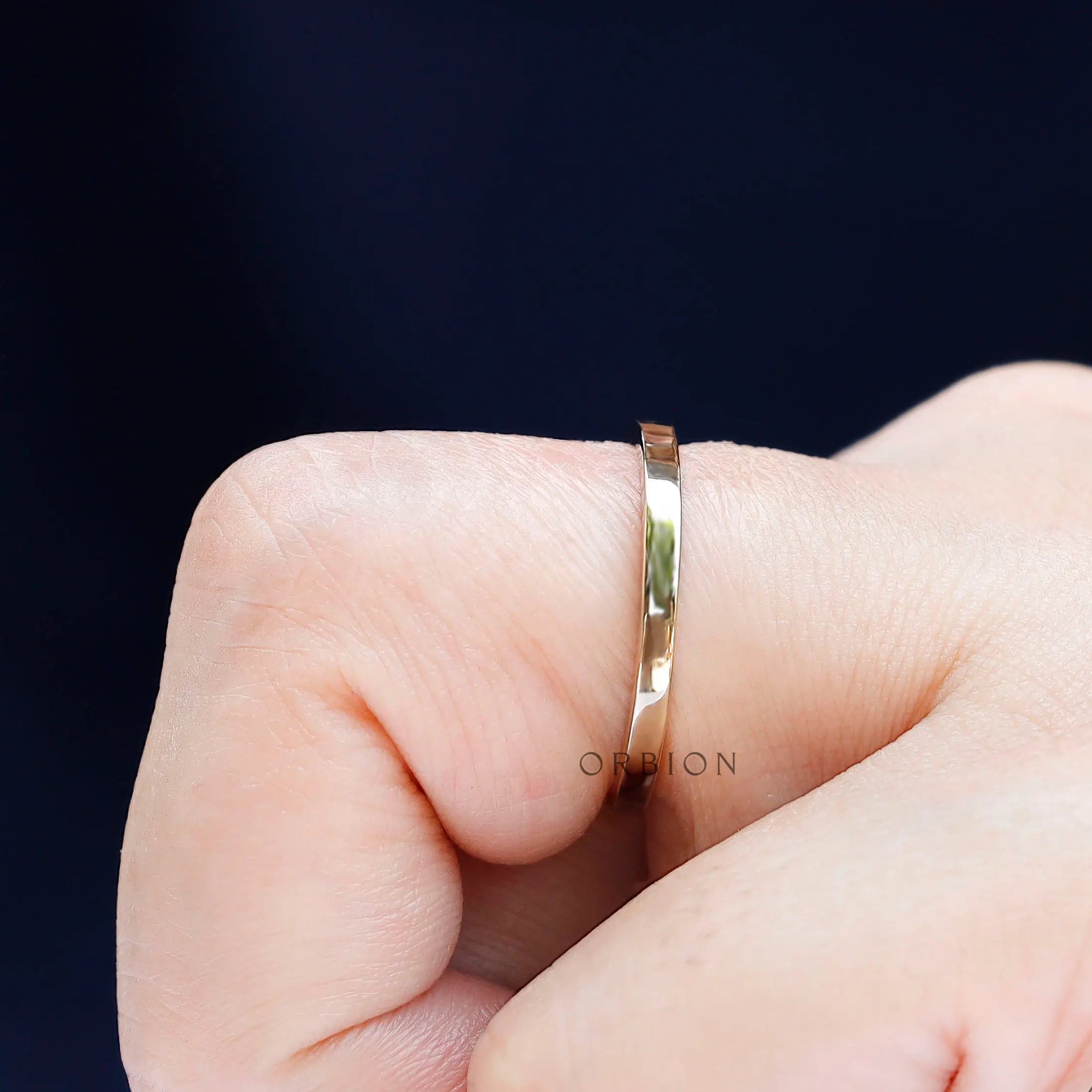 Side profile of classic 14K yellow gold band