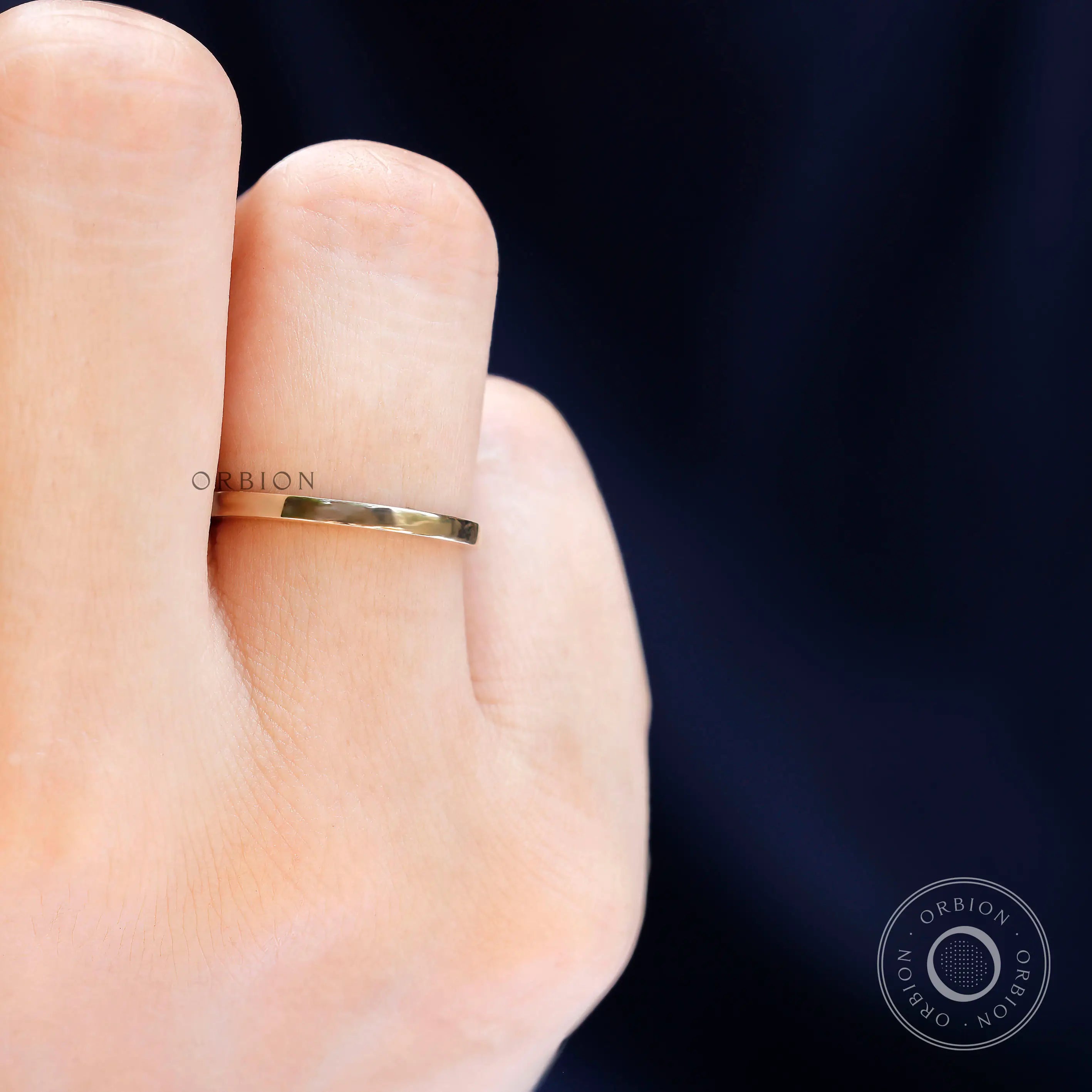 Top view highlighting minimal straight gold band