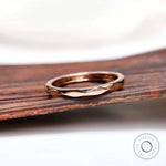 Angled view showing hammered texture and glossy finish