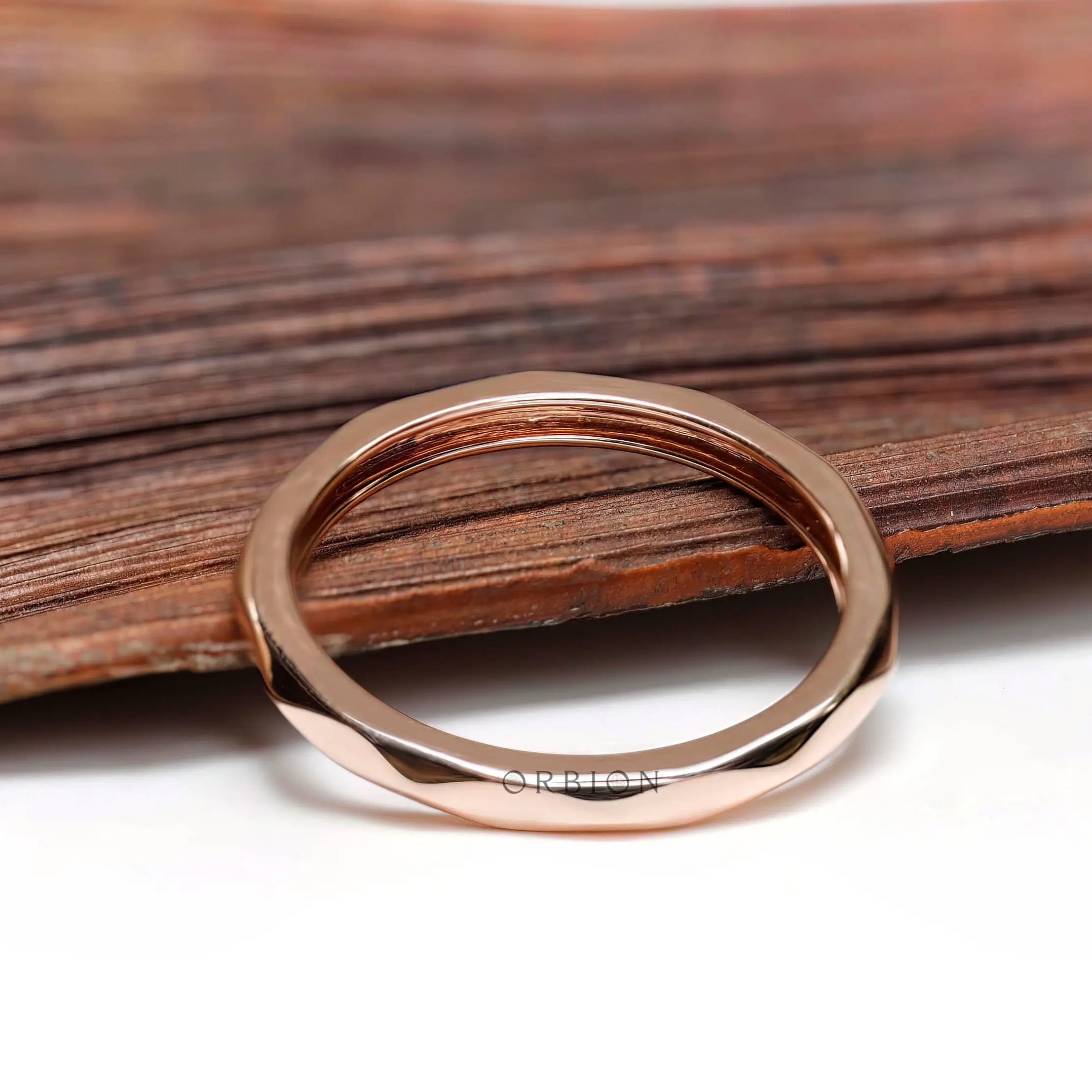 Top view of slim hammered rose gold ring