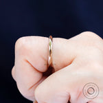 Side angle on-hand showing slim hammered profile