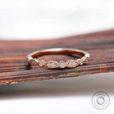 Art Deco wedding band with fine milgrain detailing in rose gold, front view