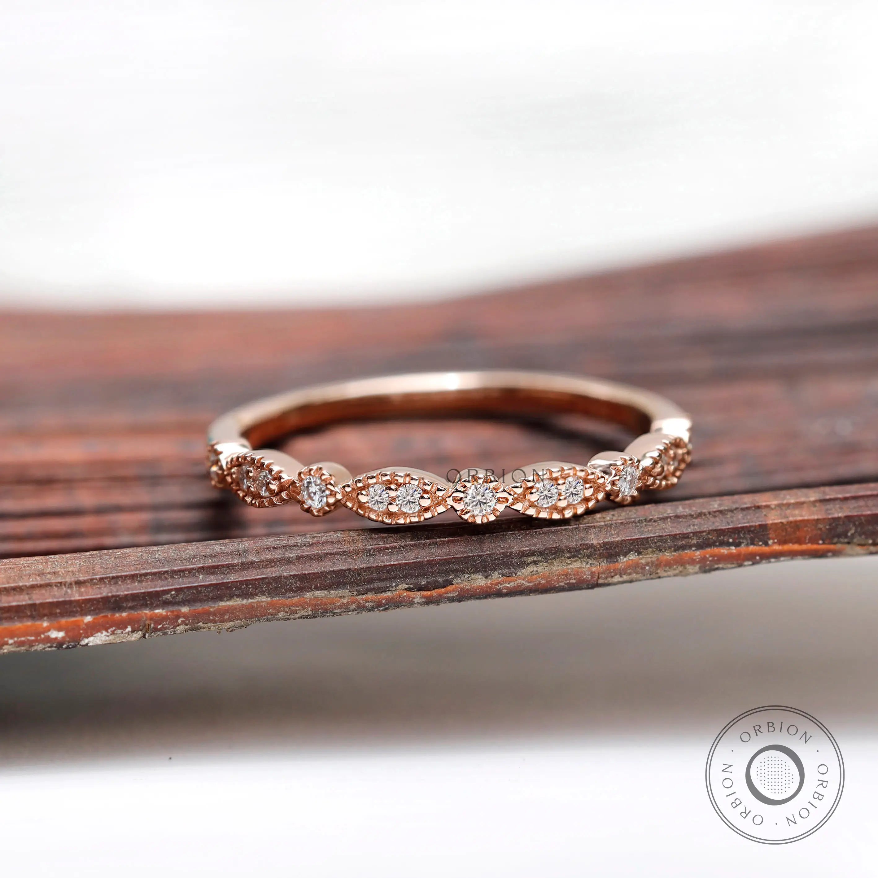 Art Deco wedding band with fine milgrain detailing in rose gold, front view