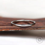 Plain back view of slim wedding band with smooth comfort fit