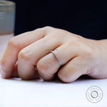 On hand view minimalist pave moissanite wedding band 