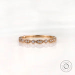Geometric marquise and round with milgrain detailing front view