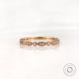 Geometric marquise and round with milgrain detailing front view