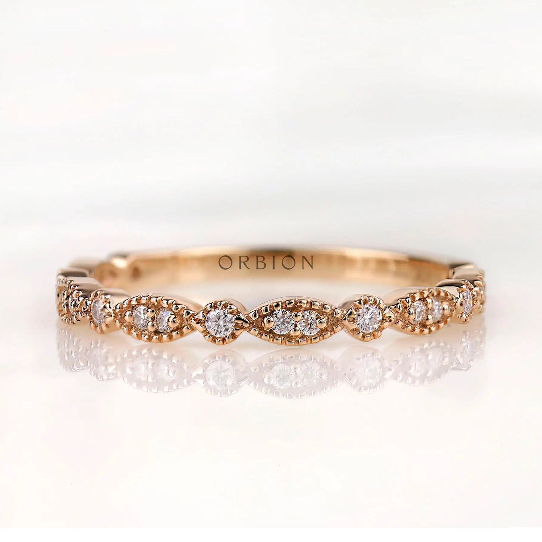 Geometric marquise and round with milgrain detailing front view