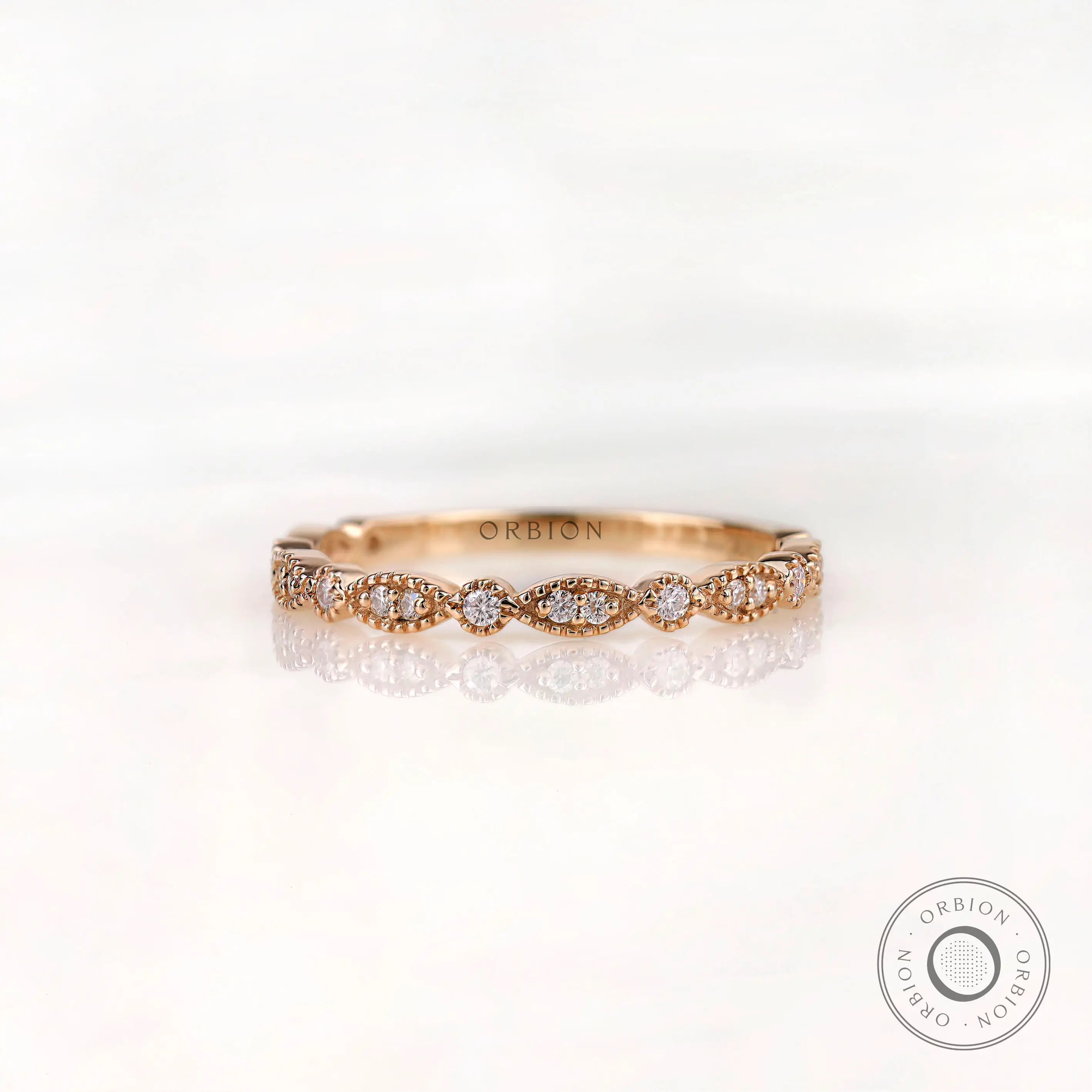 Geometric marquise and round with milgrain detailing front view