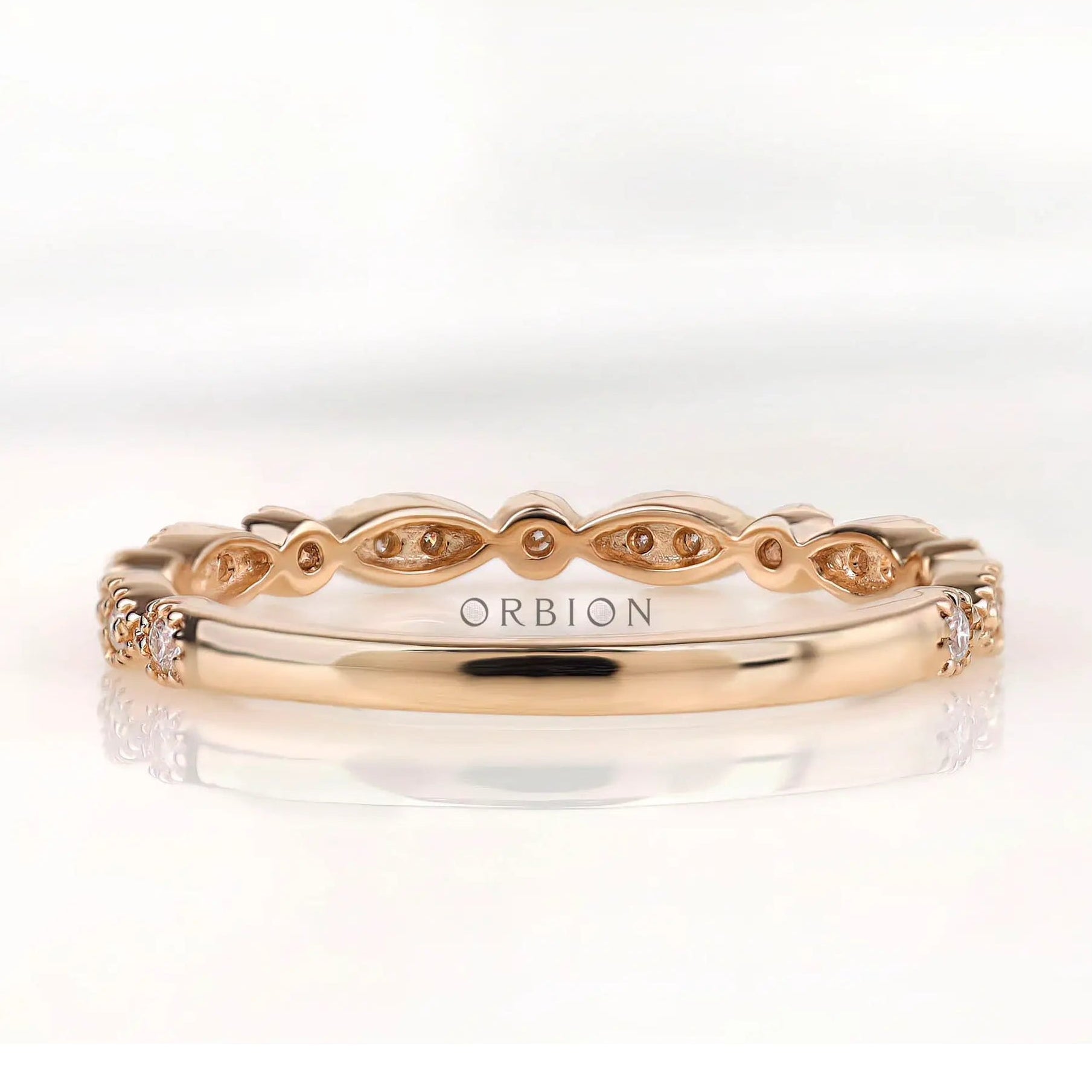 Open gallery marquise and round moissanite band showing smooth inner shank