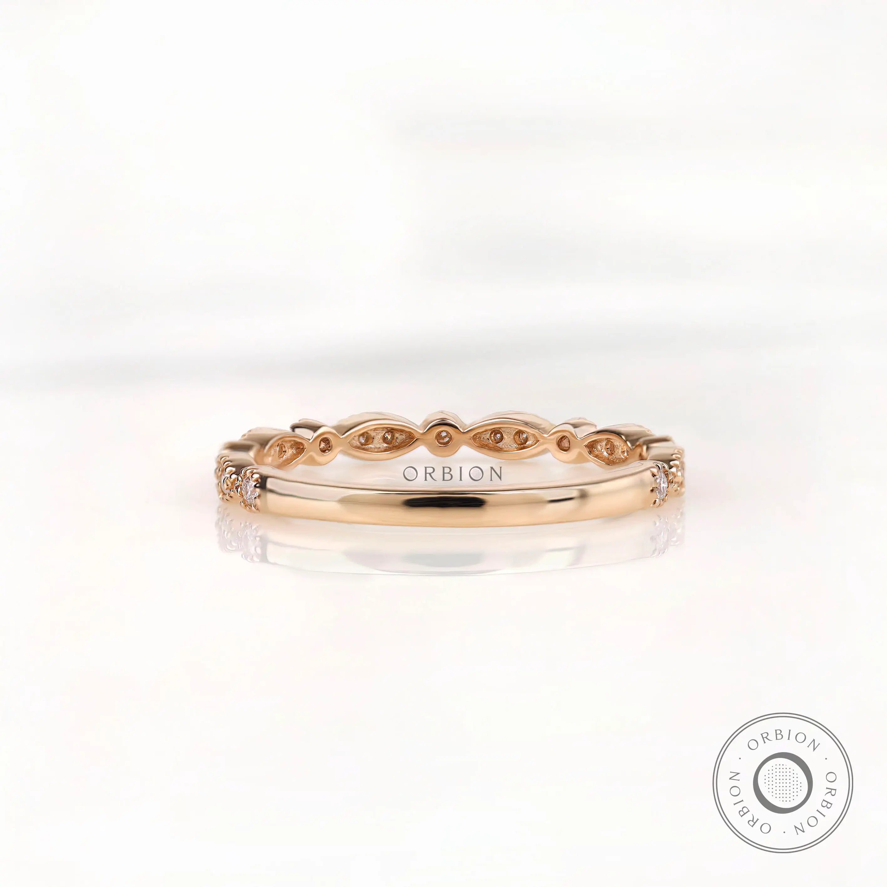 Open gallery marquise and round moissanite band showing smooth inner shank