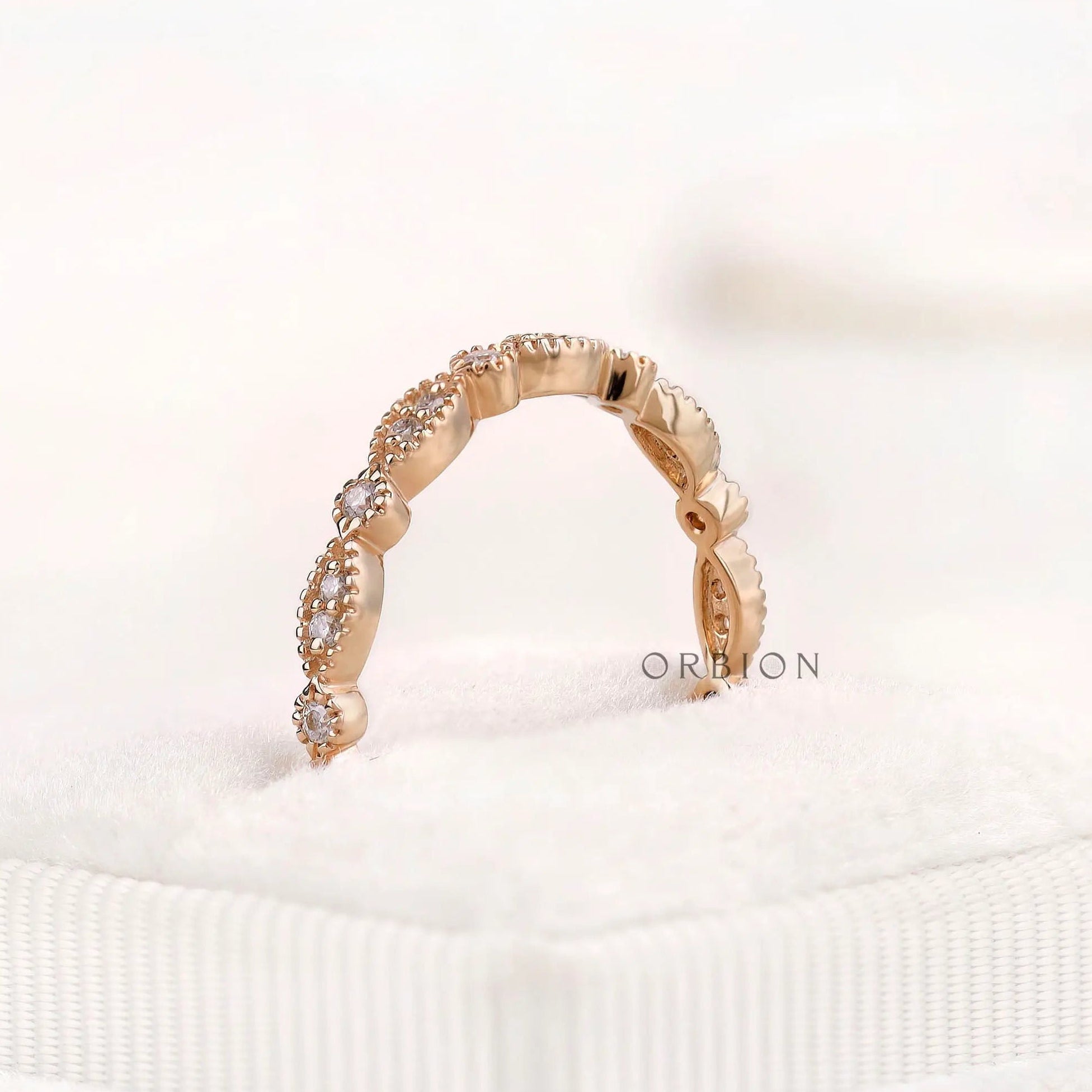 Side profile of geometric marquise and round band with vintage milgrain finish
