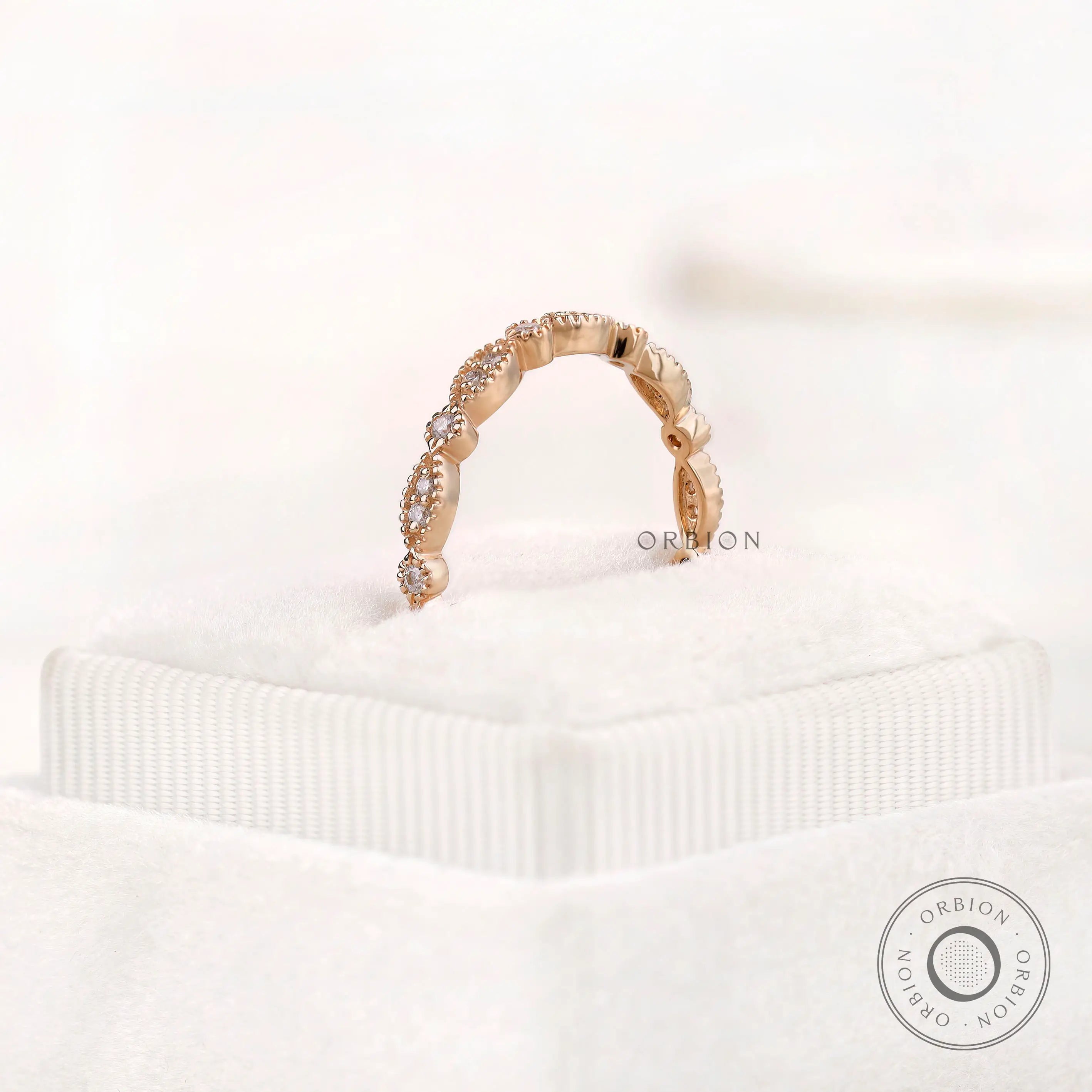 Side profile of geometric marquise and round band with vintage milgrain finish