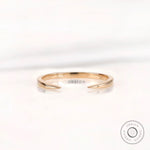 Minimalist solid gold open cuff claw wedding band front view on white background