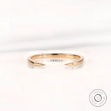Minimalist solid gold open cuff claw wedding band front view on white background