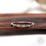 Bamboo style thin moissanite wedding band front view