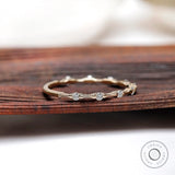 Minimalist bamboo inspired moissanite band side angle