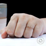 Slim bamboo style moissanite ring worn on hand
