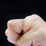 Minimalist moissanite bamboo band finger profile view