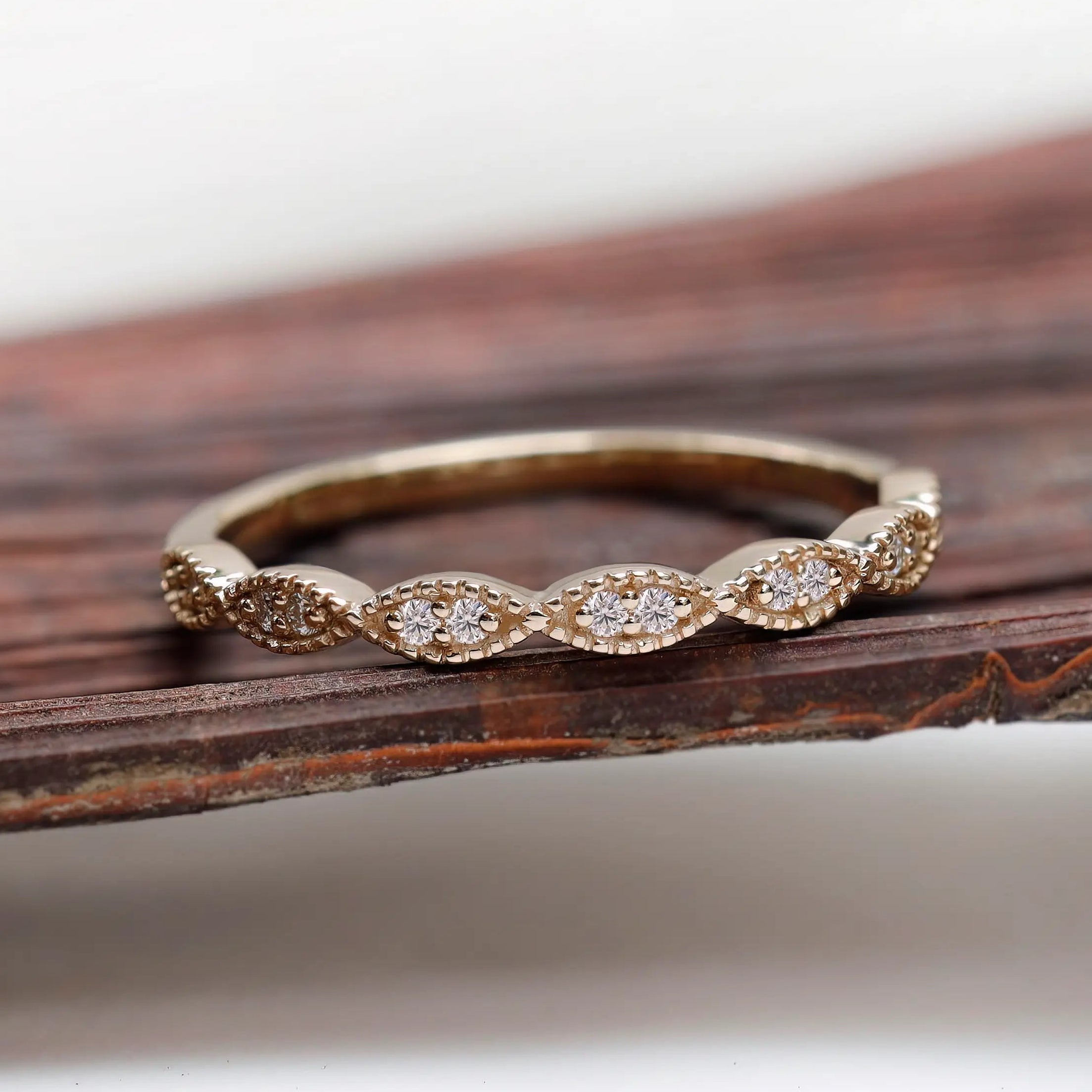 Front view geometric marquise milgrain moissanite wedding band